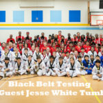 BLACK BELTS WITH JESSE WHITE TUMBLING TEAM